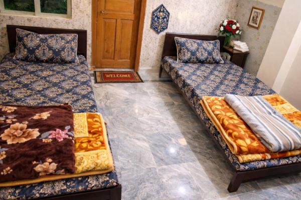 Alzahir GUESTHOUSE & HOTEL bharakahu, Забронировать  Исламабад Пакистан