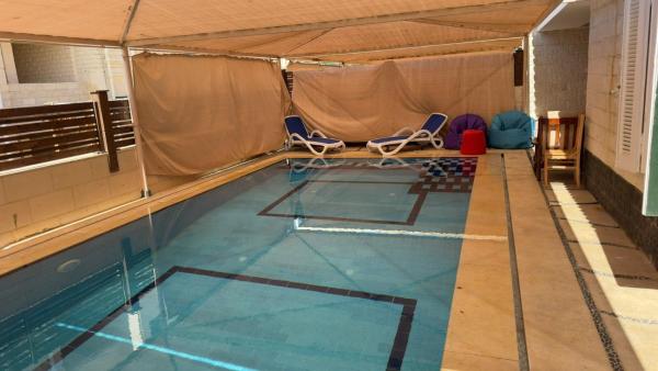 Villa 53 In Sa7el For Rent Green Beach Village Families only, Забронировать  Отели Северного побережья с парковкой, Парковка
