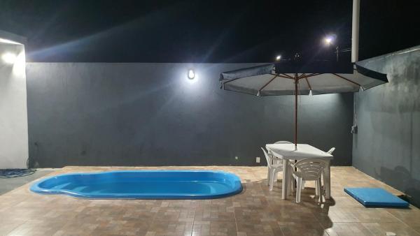 Casa com piscina Salinópolis, Забронировать  Отели Салинополиса с парковкой, Парковка