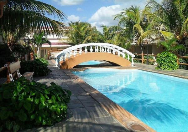Bayview Villa Holidays, Забронировать  Отели Флик-ан-Флак с парковкой, Парковка